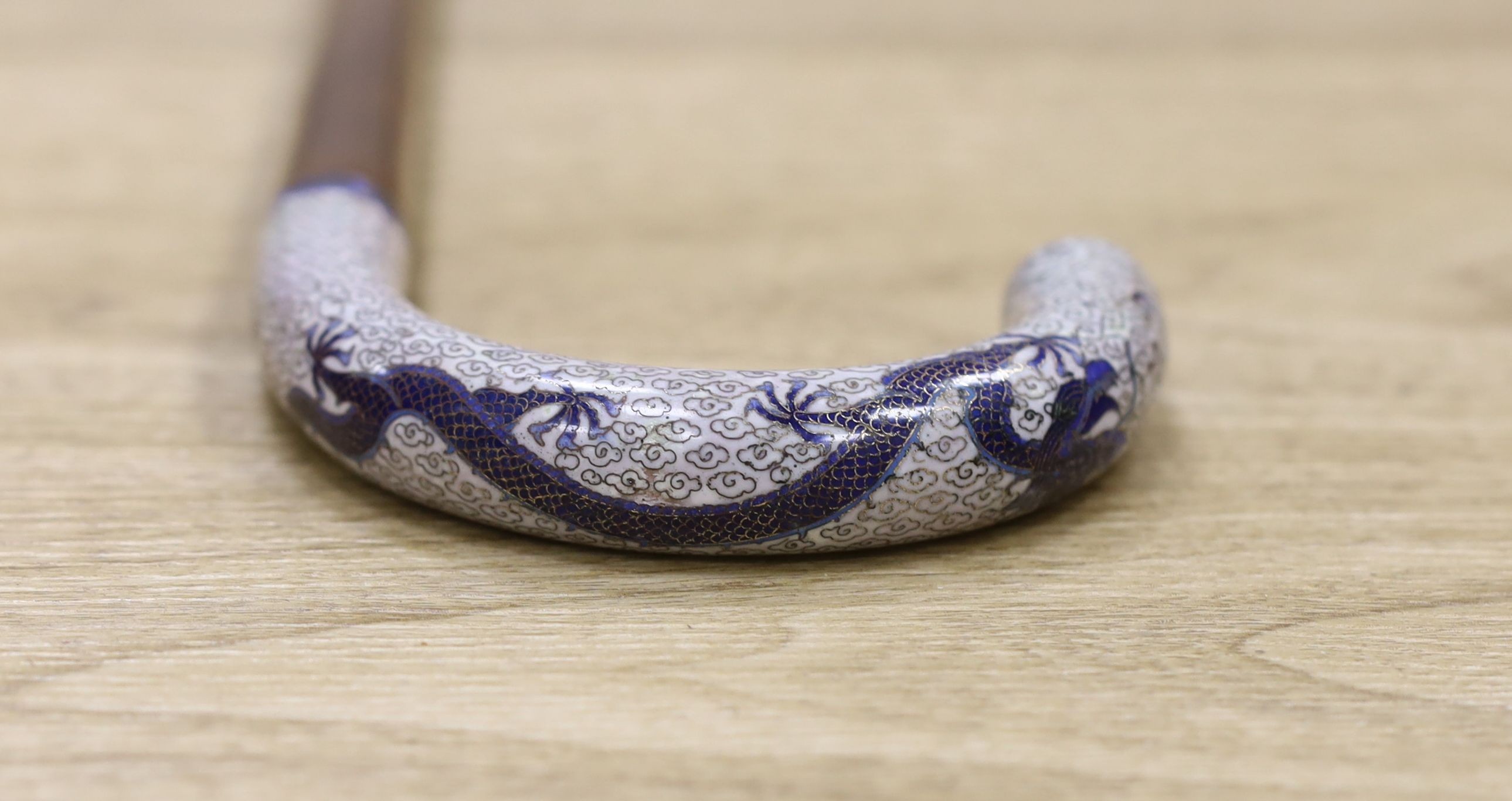 A 19th / 20th century Chinese walking stick with cloisonne handle with five claw dragon